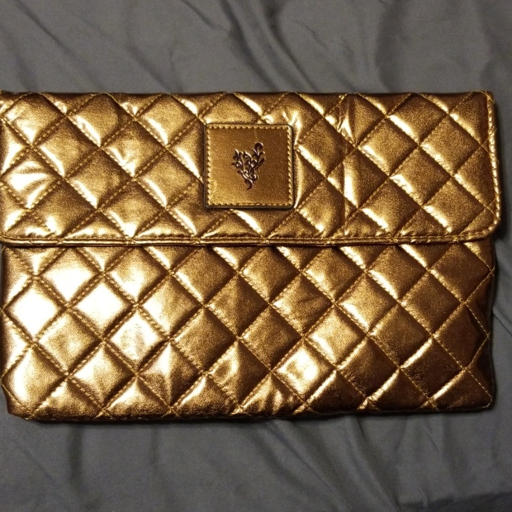 3 Younique makeup bags